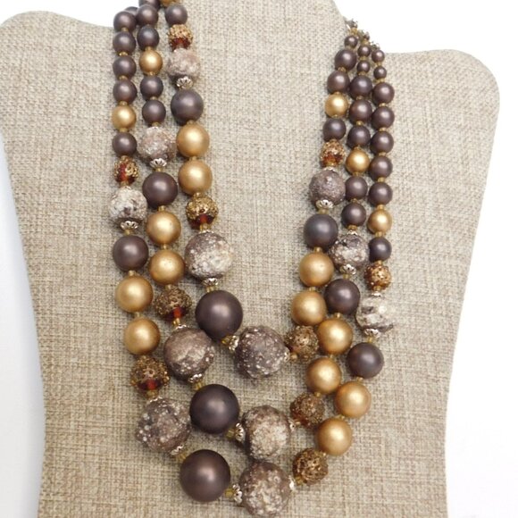 Vintage 3 strand bead necklace. Shades of brown and gold. Has moon glow beads - Picture 1 of 4